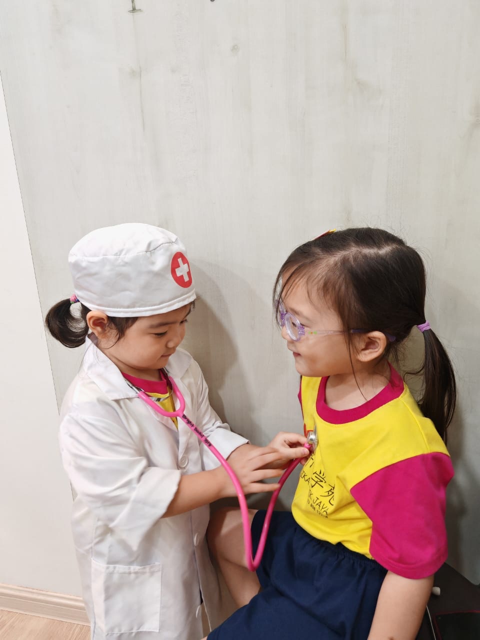 Children taking part in an imaginative role-play learning activity